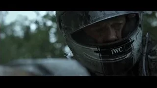 person wearing IWC helmet looking at camera — F1