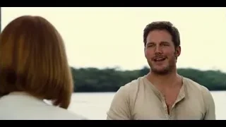 Man with beard and woman by wooden door — Jurassic World