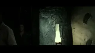 Woman standing with lantern in dark room — Harry Potter and the Deathly Hallows 2