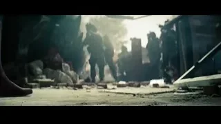 People walking on rubble-strewn street — Superman: Man of Steel
