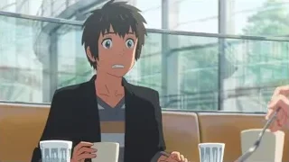 young man surprised in restaurant — Your Name