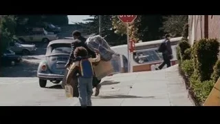 Man and child walking past vintage car — The Persuit of Happyness