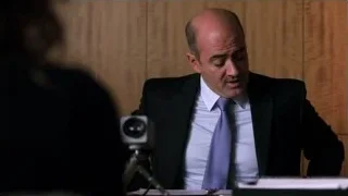 man in suit at desk in conference room — Suits