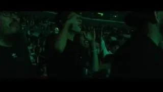 group of men cheering in an arena — Creed 3