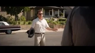 Man standing on street in front of house — Ford v Ferrari