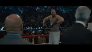 boxer in ring with arms raised — Creed 2