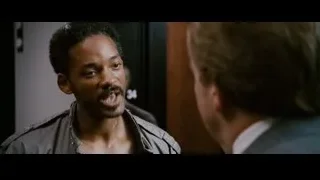 two men talking in a room — The Persuit of Happyness