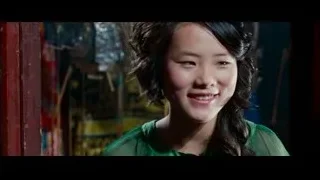 Young Asian woman smiling widely — The Karate Kid