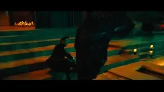 Two people martial arts fighting on stairs — John Wick: Chapter 4