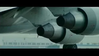 underside of airplane with two engines — The Karate Kid