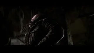 Man wearing gas mask in dark underground tunnel — Batman: The Dark Knight Rises