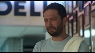 Man deep in thought by DELTA sign — The Bear