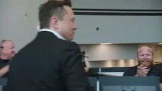 man giving presentation in conference room — Elon Musk: Return to Space