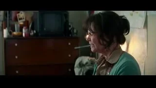 upset woman with head in hands near map — The Amazing Spider Man 2