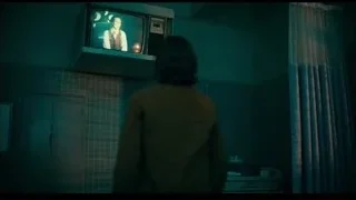 man in hospital room with patient — Joker