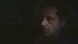 man's face with serious expression in dark room — Succession
