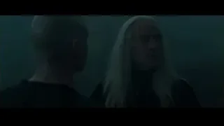 Bald man and blonde woman in tense conversation — Harry Potter and the Goblet of Fire