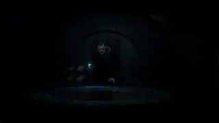 Hand reaching towards small blue light in dark — Now You See Me 2