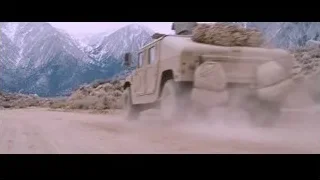 vehicle on snowy mountain road — Iron Man