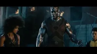 man in metallic skull suit holding sword — Deadpool 2