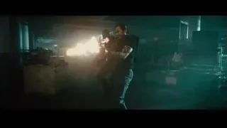 person with gun in dark room — Furious Seven