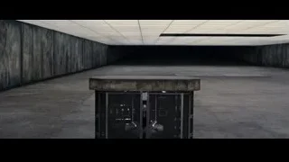 Empty dark industrial room with concrete walls — Batman: The Dark Knight Rises