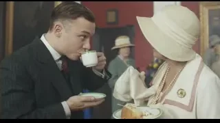 man and woman conversing at restaurant table — Peaky Blinders