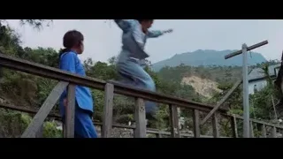 two men walking on wooden bridge — Bruce Lee: Enter The Dragon