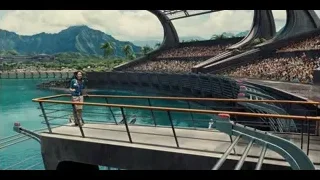 Crowd gathered on pier overlooking ocean — Jurassic World