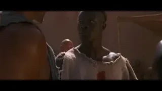 Men in traditional clothing in temple room — Gladiator