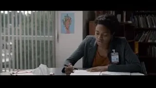 Young woman deep in thought at office desk — Southpaw