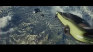 vehicles flying over mountainous landscape — Furious Seven
