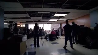 People in a large office room — Breaking Bad