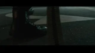 Person on city street with explosion — Furious Seven