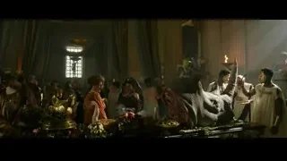 people gathered around ornate table with lion statue — Gladiator 2