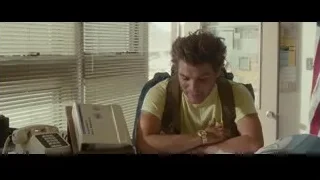 young man sitting at office desk — Into the Wild