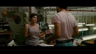man and woman conversing in workshop — The Dictator