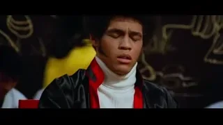 Young man with afro in leather jacket — Bruce Lee: Enter The Dragon