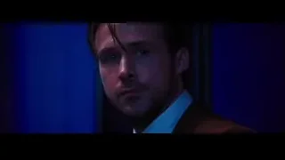 man in dark suit with serious expression — La La Land
