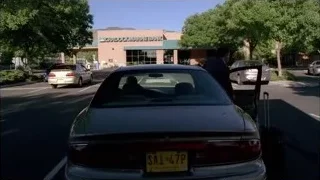 Man walking to car in bank parking lot — Breaking Bad