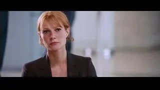 red-haired woman's serious face close-up — Iron Man