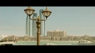 people on a pier overlooking a city — Furious Seven