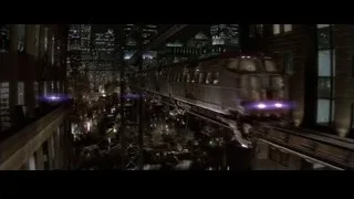 Aerial view of city ruins at night — Batman