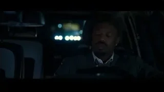 man in suit deep in thought in car at night — Creed 3