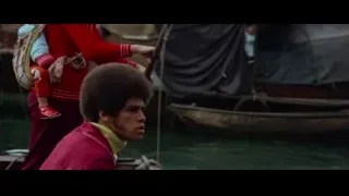 man and woman with child in boat — Bruce Lee: Enter The Dragon