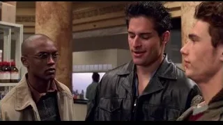 three men in room with columns — Spider Man