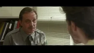 policeman sitting in office — Into the Wild