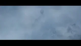 foggy mountain peak with tower — Doctor Strange 2