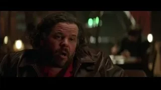 man in leather jacket deep in thought — Batman