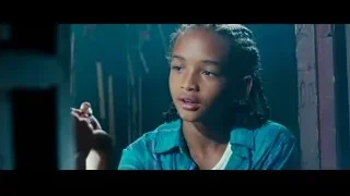 young girl with braided hair in dark room — The Karate Kid